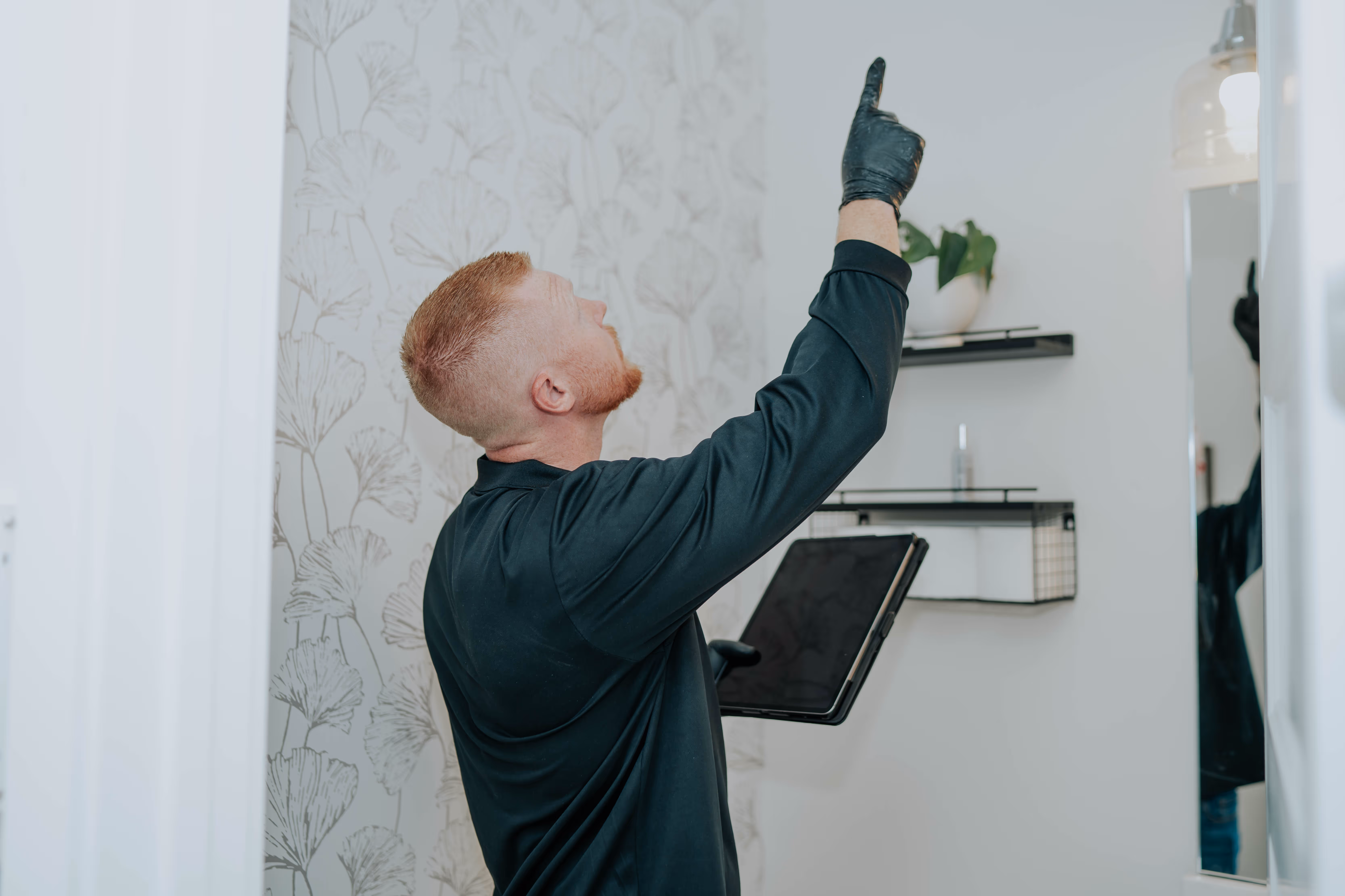 Pure Maintenance of Central Illinois specialist inspecting a property